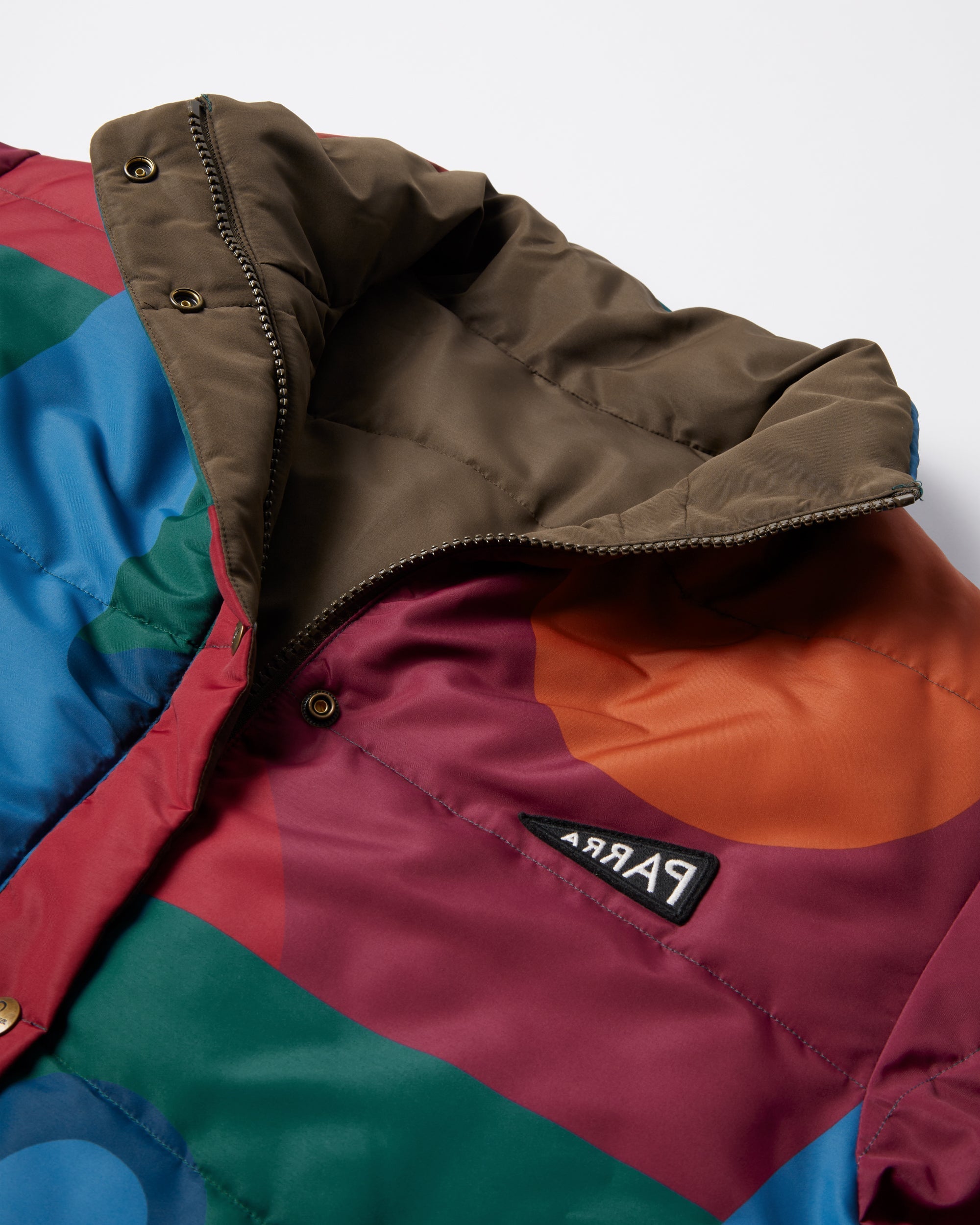 Protect the sun reversible puffer jacket – by Parra EU