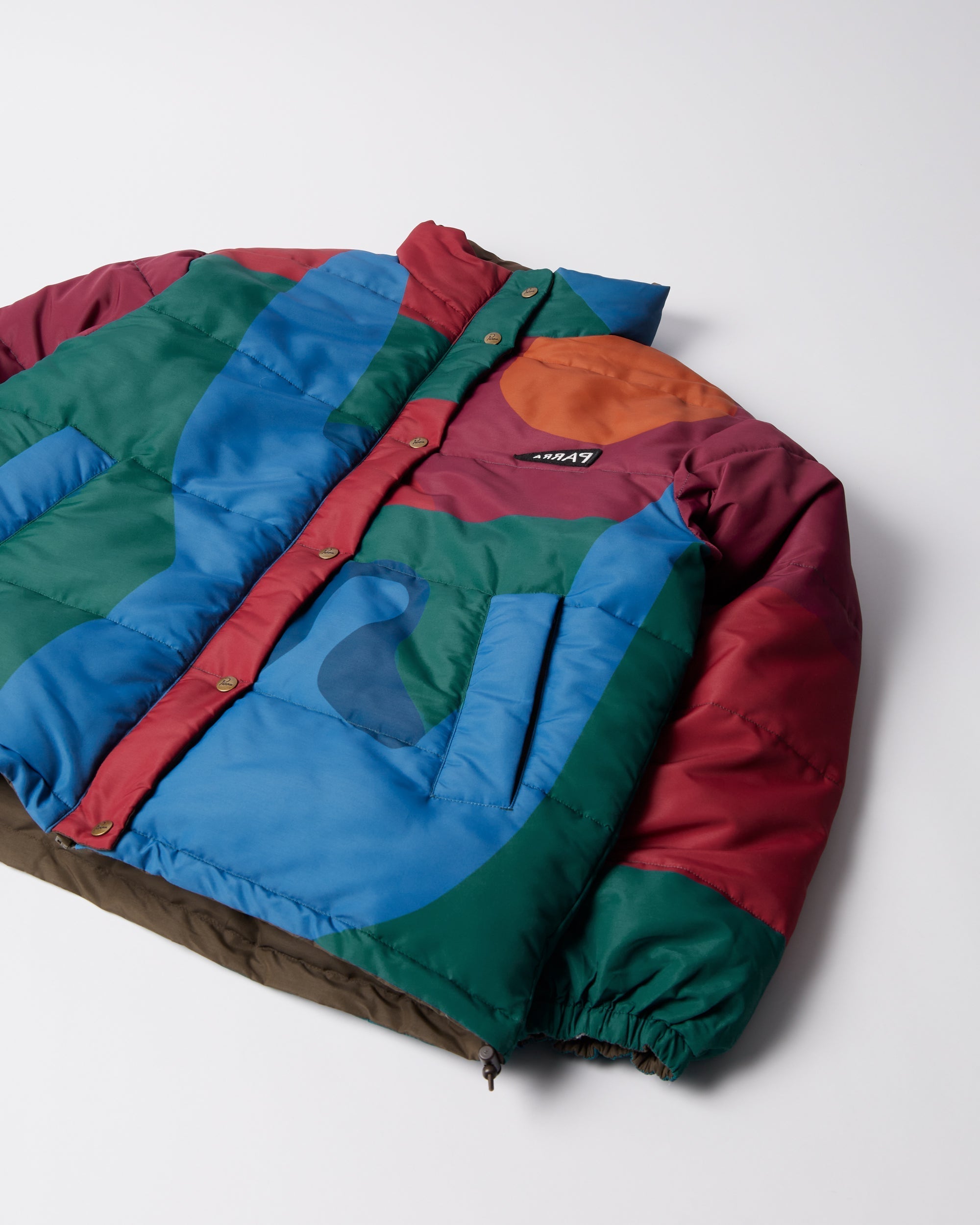 Protect the sun reversible puffer jacket – by Parra EU